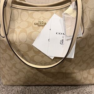 NWT Coach Year of the Dragon Signature Tote Bag with magnetic closure